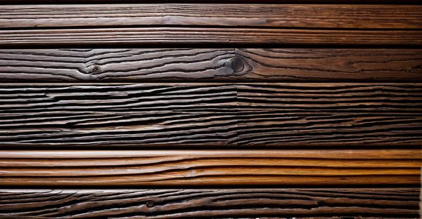 Choisir le bon saturateur pour protéger votre bardage en bois